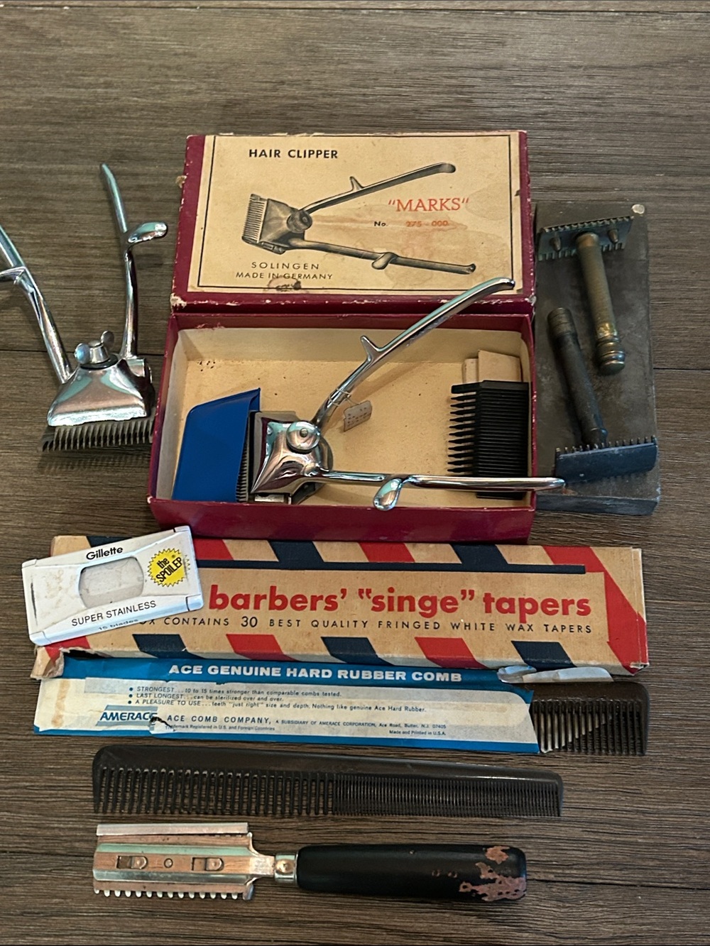 Vintage barber shop items hair clippers singe tapers razors combs whet stone